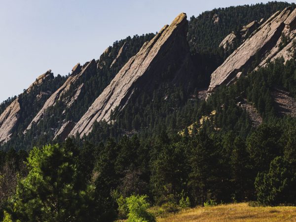 A beautiful shot of the flatirons cliffs in Boulder, Colorado